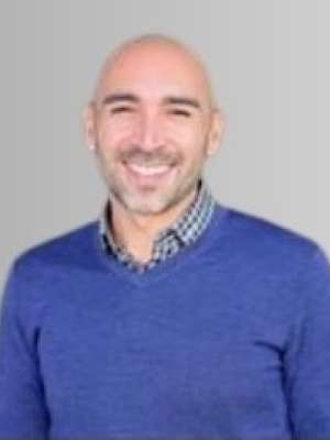 Profile photo of Dr. Hidalgo smiling