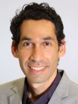 Head shot of Jesus Campagna smiling at the camera