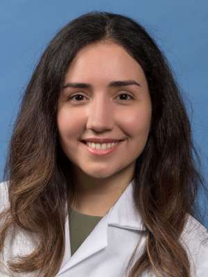 Forough Sargolzaeiaval, MD in white lab coat