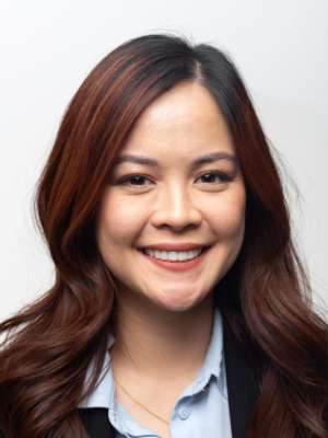 Headshot of Rachel Sunoco in dark jacket and light blue shirt