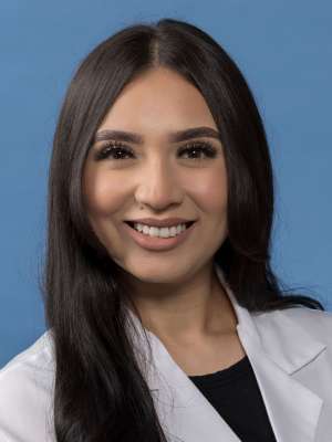 Valeria Rangel, PhD in a white lab coat