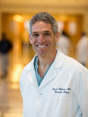 headshot of David A. Rigberg, MD taken in the hallway of a hospital