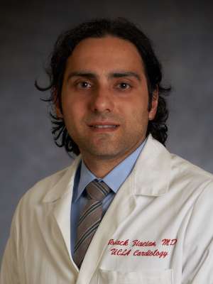 Boback Ziaeian, MD, PhD headshot wearing a white coat and tie