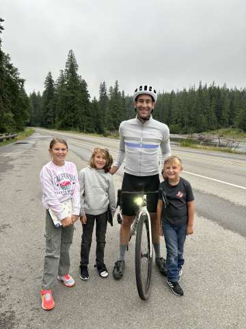 Photo of DAPM Anesthsiologist Colby Tanner, MD with his children after a bike ride