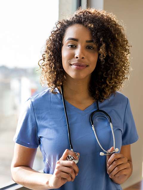 Female Doctor at Window