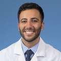 A headshot of George Mina, MD