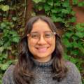 Headshot of Kimberly Ramirez wearing a grey sweater