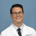 William J. Carroll, MD