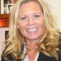 Headshot of Andrea Hevener in Black Blazer