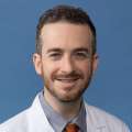 Guy A. Weiss, MD