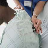 Man having examination in hospital.