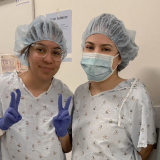 Karina, right, received a life-saving kidney from her sister, Rosa, left, in October 2023; both are wearing hospital scrubs