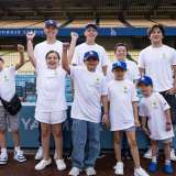 Pediatric cancer survivors and patients on the field at Dodger Stadium