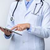 Doctor on a computer