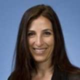 Dr. Alyssa Ziman, smiling, against a blue background.