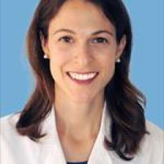 headshot of Melissa Lechner in white lab coat