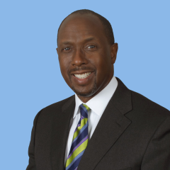 Vincent Rowe, MD with blue background