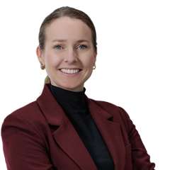 headshot of Brenda Sanz in a burgundy blazer