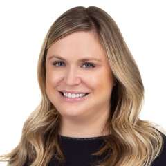 headshot of Dr. Elizabeth Hutchins in black blouse