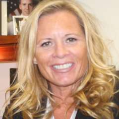 Headshot of Andrea Hevener in Black Blazer