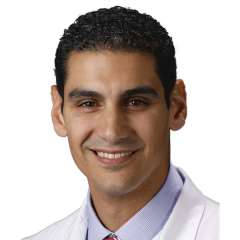headshot of Dr. Bassem Shoucri in white lab coat