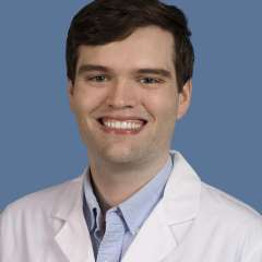 Travis R. Hallett, MD