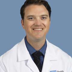 John J. Hollowed, MD